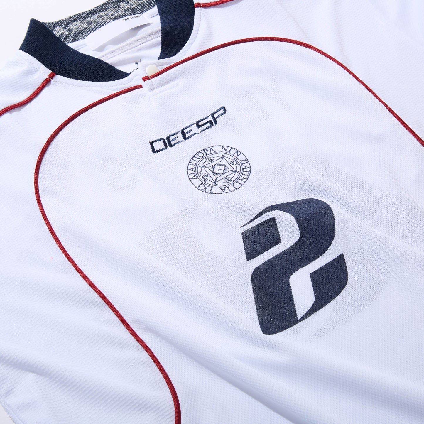 DIASPORA SKATEBOARDS/YE PEEPS Football Top