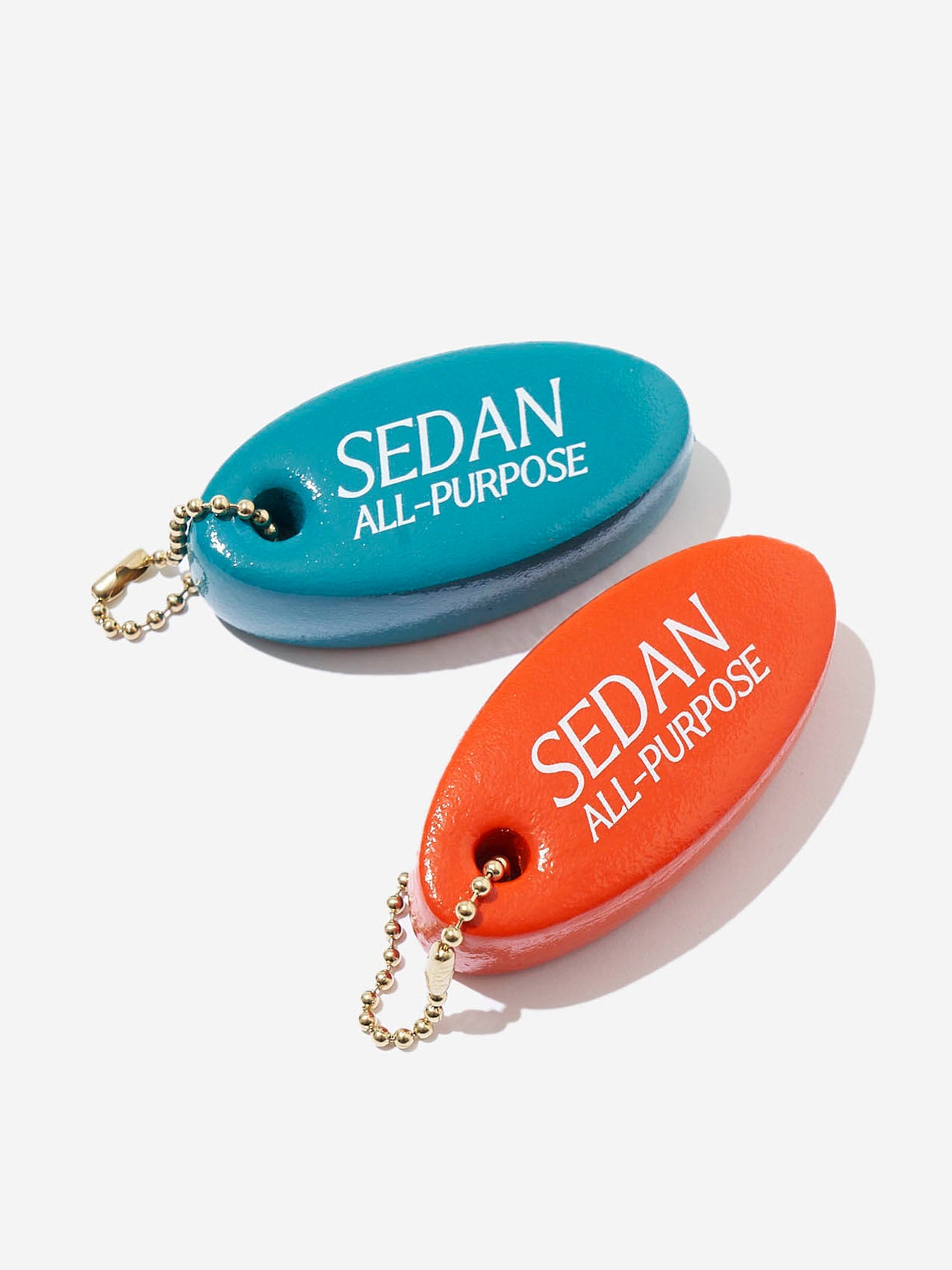 SEDAN ALL-PURPOSE(セダンオールパーパス)/Oval Logo Key Float(Teal)