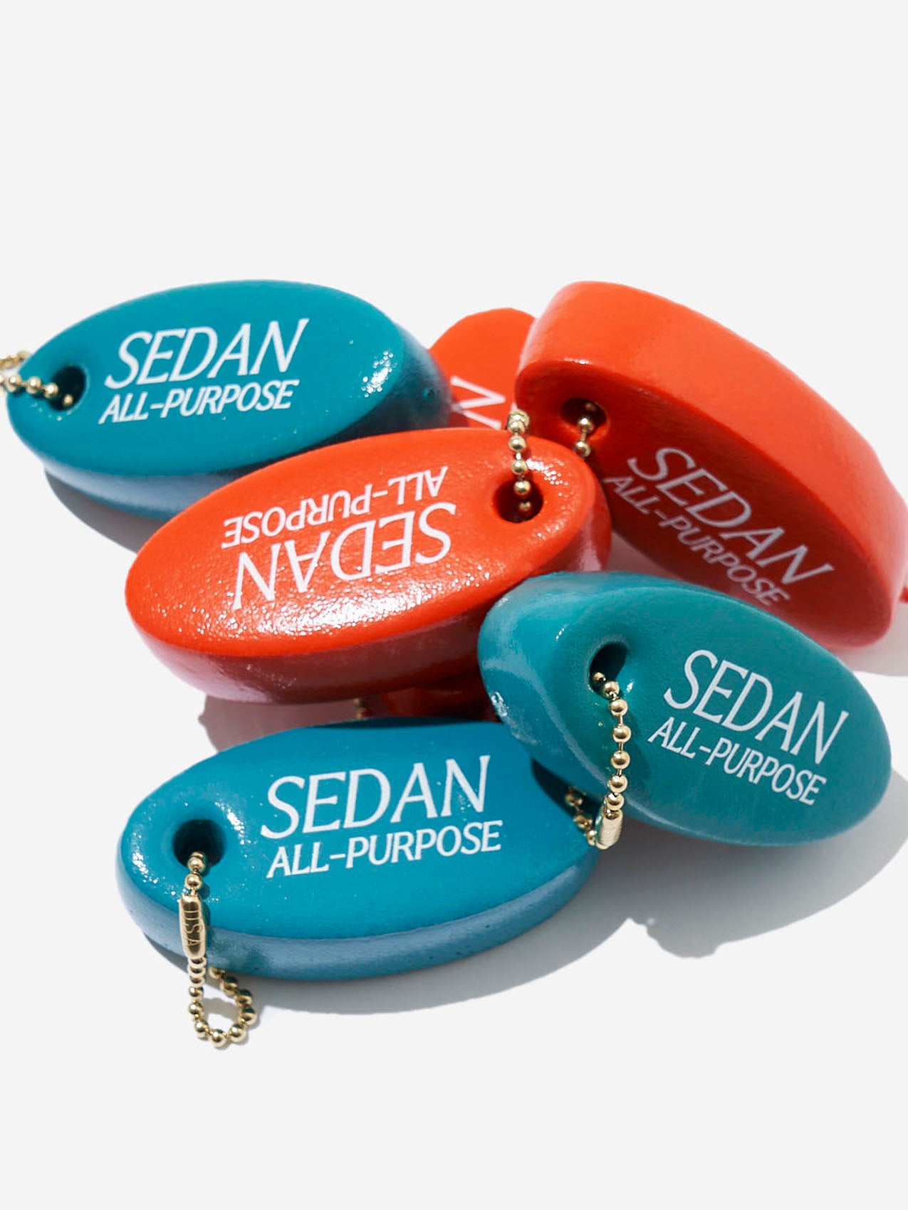 SEDAN ALL-PURPOSE(セダンオールパーパス)/Oval Logo Key Float(Teal)