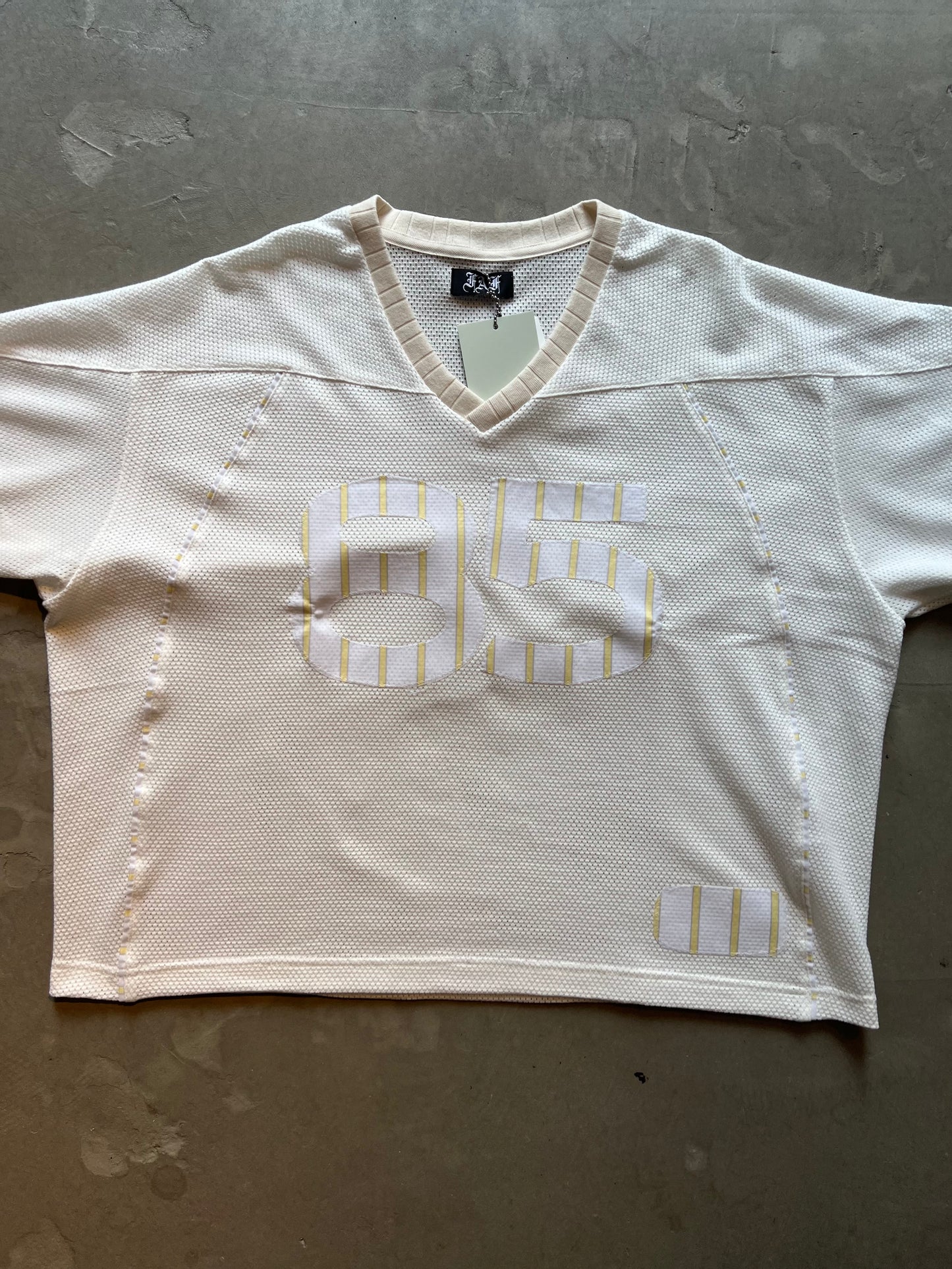 FAKE AS FLOWERS/Stripe Football Jersey