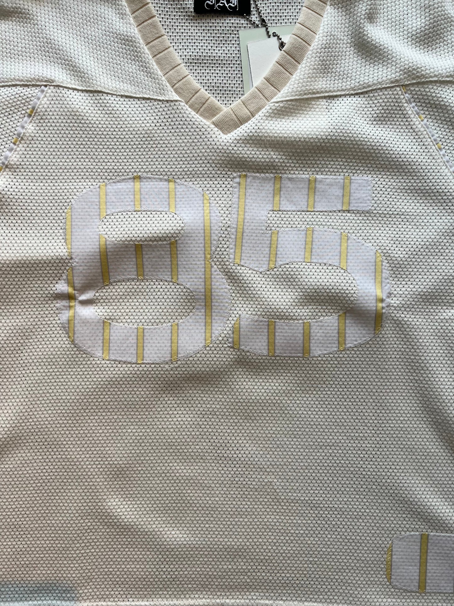FAKE AS FLOWERS/Stripe Football Jersey