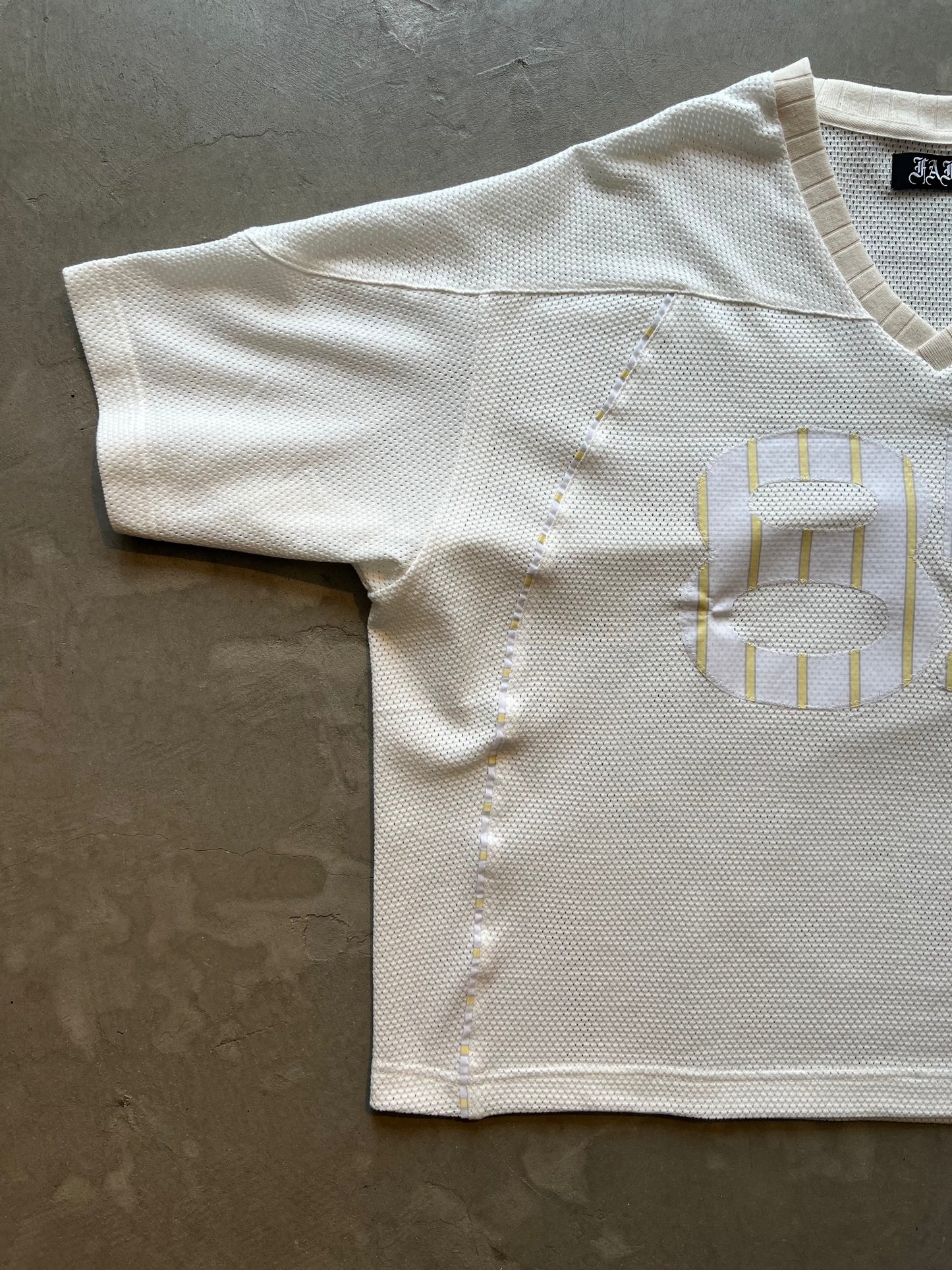 FAKE AS FLOWERS/Stripe Football Jersey