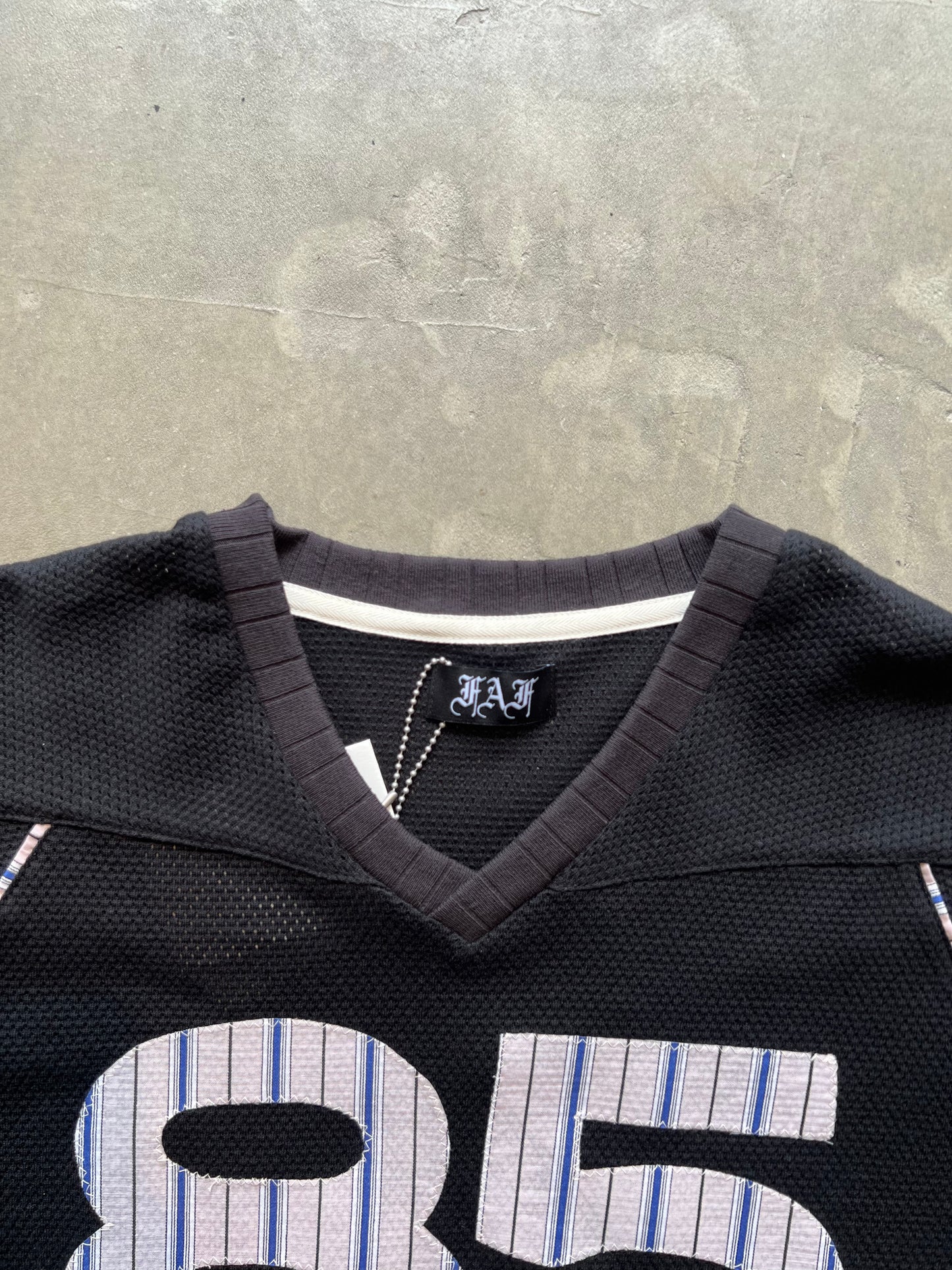 FAKE AS FLOWERS/Stripe Football Jersey