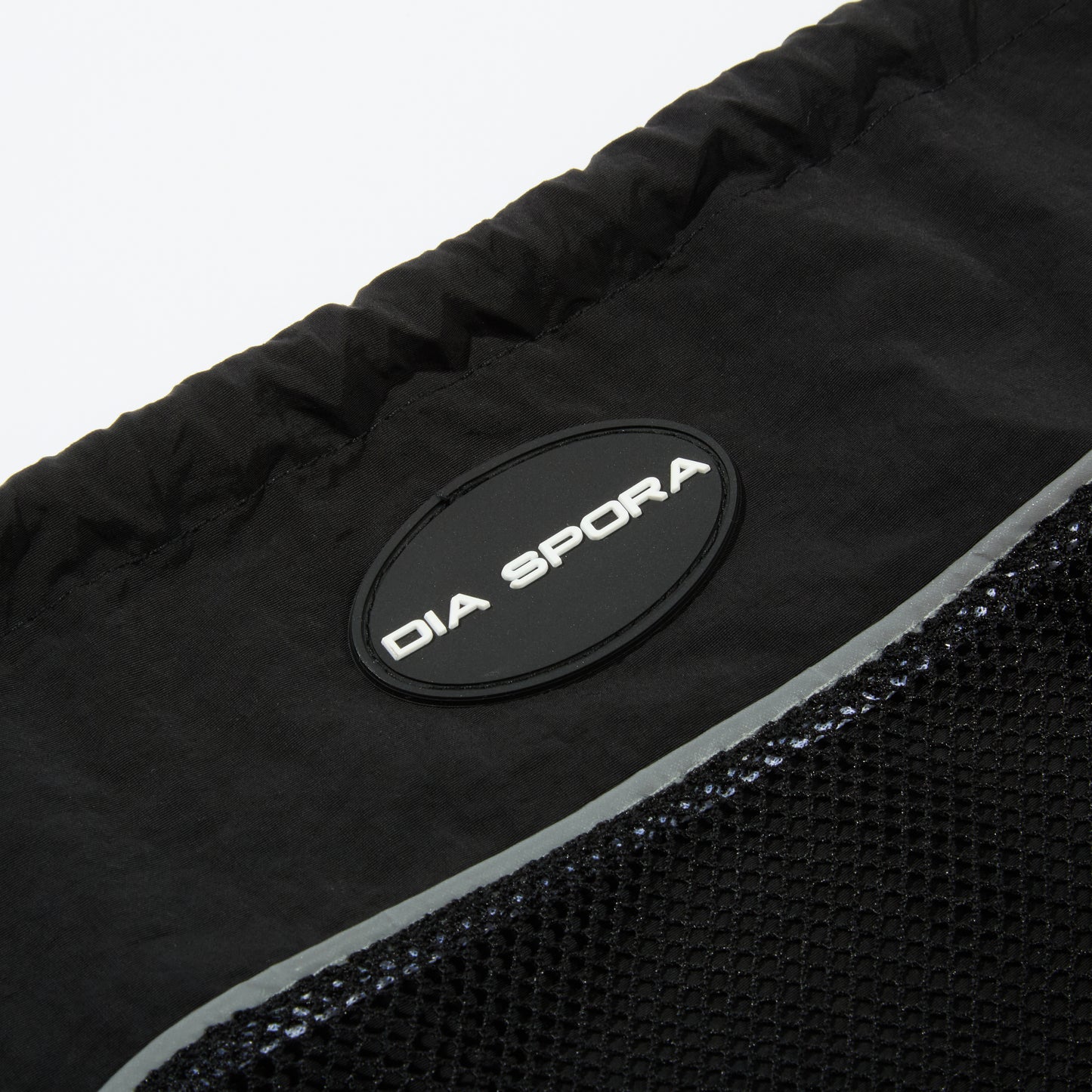 DIASPORA SKATEBOARDS MESH KNAPSACK(BLACK/SAND)