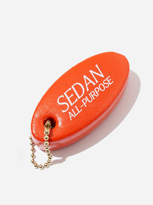 SEDAN ALL-PURPOSE(セダンオールパーパス)/Oval Logo Key Float(Orange)
