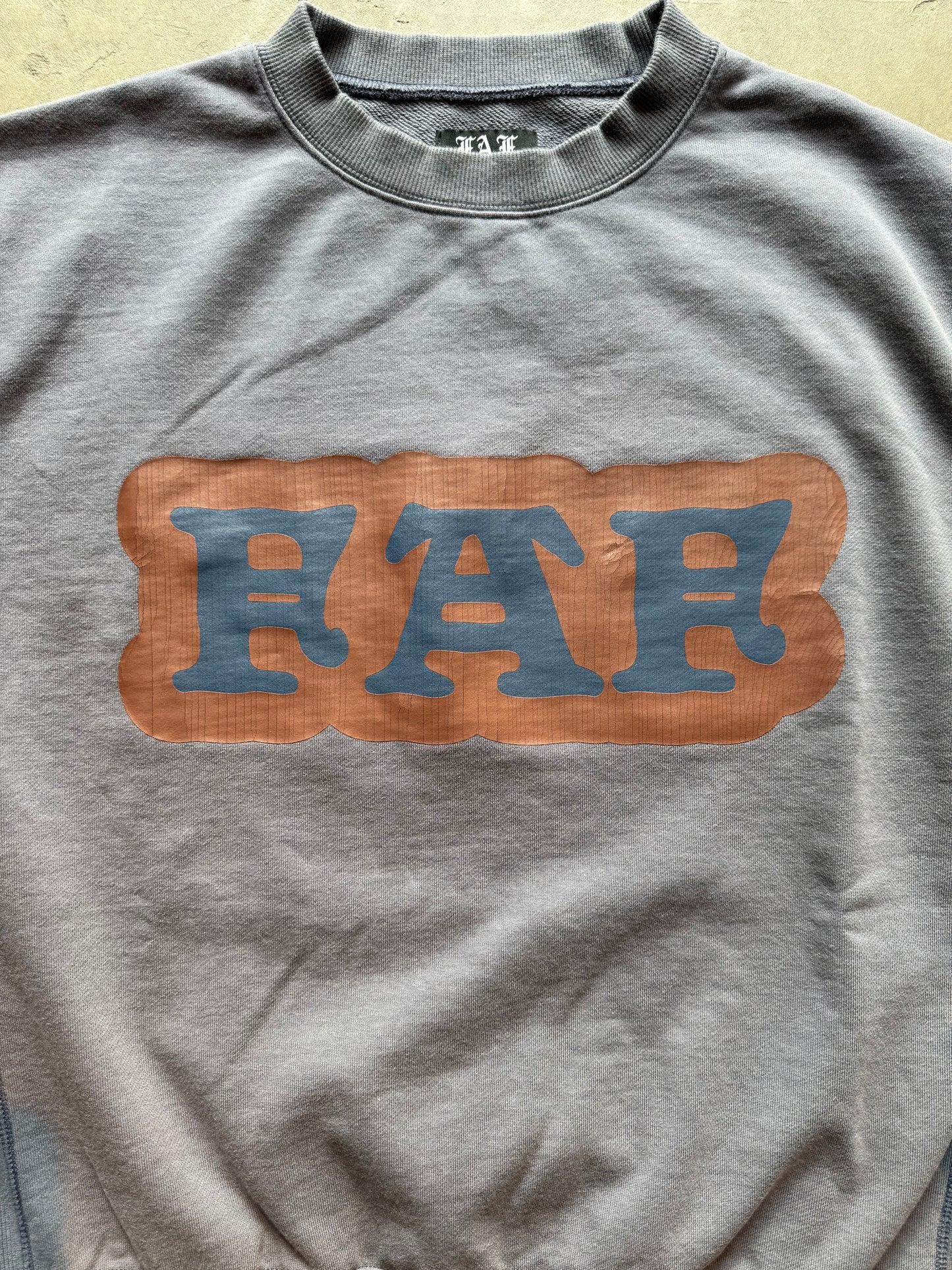 FAKE AS FLOWERS/Cracked Commercial Logo Crewneck Sweat